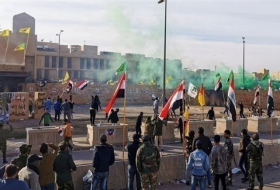 استمرار المواجهات في محيط السفارة الأمريكية ببغداد