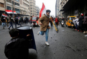 العراق.. قتيلان و15 جريحا بمواجهات بين قوات الأمن ومحتجين