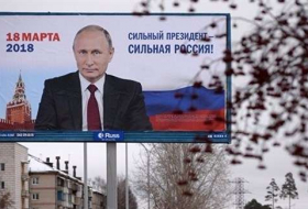 بوتين يخوض حملة بالحد الأدنى قبل شهر من الانتخابات الرئاسية