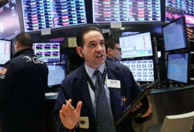 سوق الأسهم الأمريكية تغلق على ارتفاع بعد تداولات متقلبة