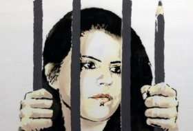 لوحة عملاقة لبانسكي في نيويورك دفاعا عن رسامة خلف القضبان في تركيا