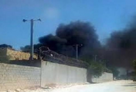 قذائف تشعل خزان وقود قرب مبنى السفارة الأمريكية في طرابلس