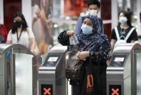تطبيق الارتداء الإجباري للكمامة في ماليزيا