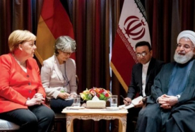 ميركل لروحاني: على إيران العودة للالتزام بالاتفاق النووي