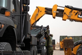 العراق يتسلم أسلحة ومعدات عسكرية مقدمة من التحالف الدولي