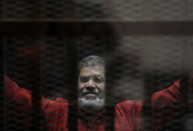 مرسي للمحكمة: أنا حاضر كالغائب