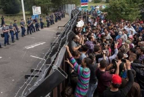 رئيس وزراء المجر: اللاجئون 